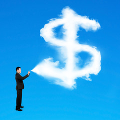 Businessman spraying dollar sign shape cloud paint isolated on b