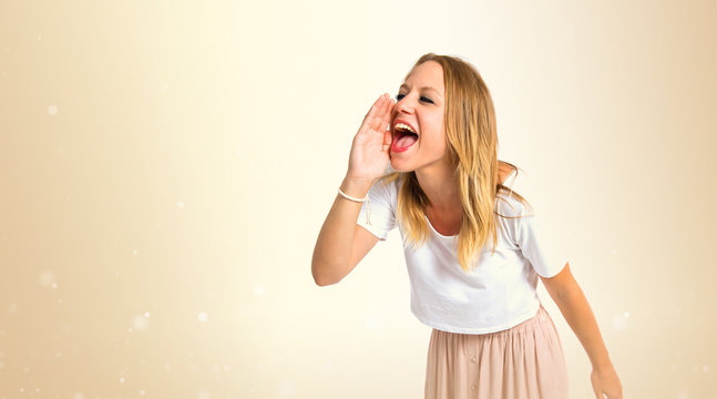 Girl shouting over isolated white background