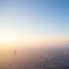 Fototapeta premium fog over Freiburg, Germany at sunset