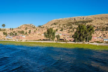 Foto op Canvas Titicaca Lake shoreline in the peruvian Andes at Puno Peru © snaptitude