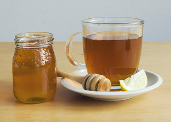Cup of tea with honey and lemon