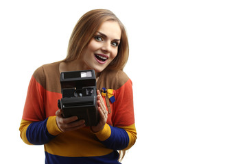 beautiful girl with old retro camera in hand isolated