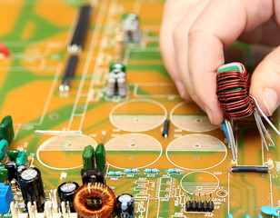 PCB mounting by human hands. In manual soldering TECHNOLOGIES th
