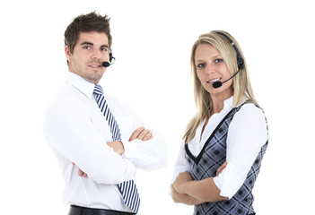 Young employee working with a headset and accompanied by his