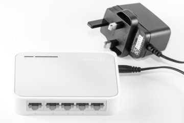 Five port ethernet switch with adaptor