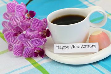 Happy Anniversary card with pink orchid and cup of coffee