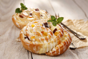 Sweet bun with raisins and cheese