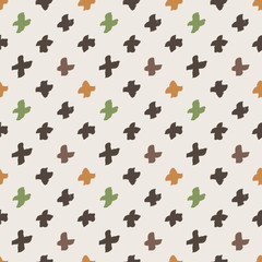 Seamless pattern of colorful hand-painted crosses