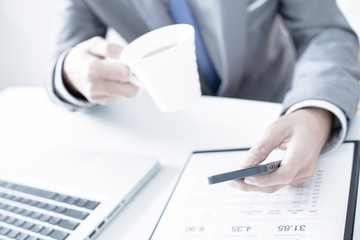 business, technology and internet concept - close up of man hand