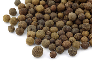 dried allspice(Jamaica pepper) on a white background