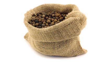 dried allspice(Jamaica pepper) in a burlap bag