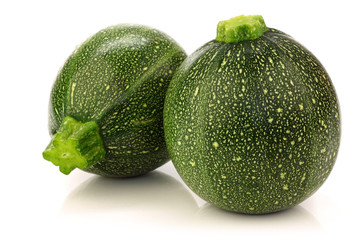 fresh Round Zucchini's on a white background