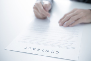 Business man signing a contract