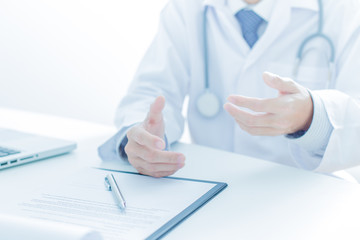 Close-up of a medical worker with laptop