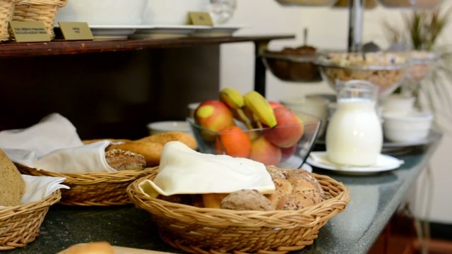 baked goods and fruits with milk - buffet in restaurant