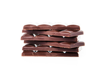Chocolate bars stack isolated on white background.  Chocolate bl