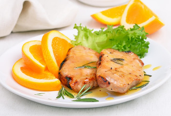 Pork chop with orange sauce