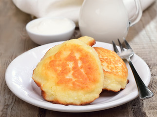 Fritters on rustic table