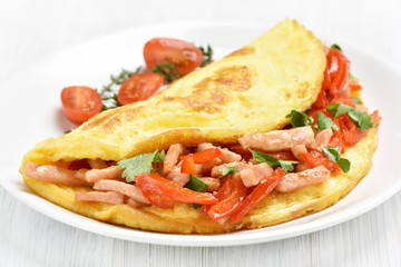 Omelette with ham and vegetables