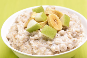 Porridge oats with apple and bananas slices