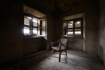 old abandoned room with chair - Powered by Adobe