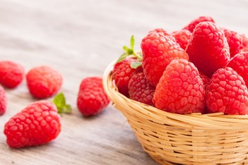 Raspberries in a basket close up shot