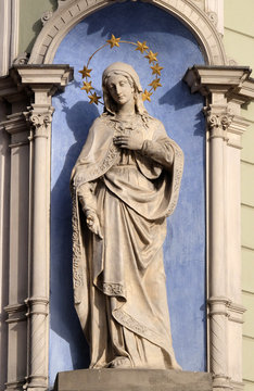 Virgin Mary, statue on the house facade in Graz, Austria