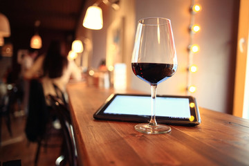 glass with red wine, tasting, restaurant