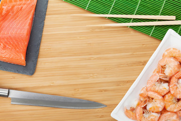 Fresh sea food and kitchen utensils