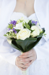woman hands and bouquet of flower