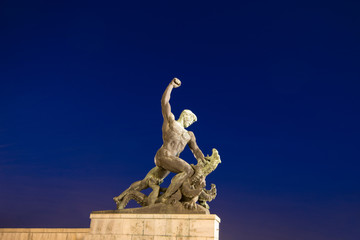 Liberty monument in Budapest at night, memorial statue