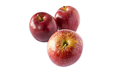 Fototapeta na wymiar Delicious red apples on white background