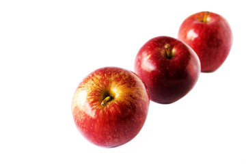 Delicious red apples on white background