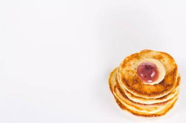 isolated stack of pancake with banana and jam