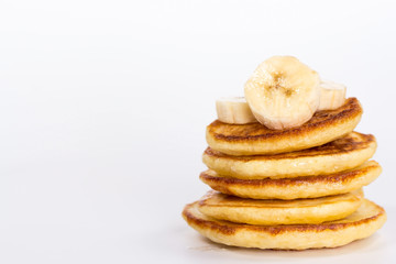 isolated stack of pancake with banana - obrazy, fototapety, plakaty