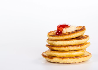 isolated stack of pancake with banana and jam