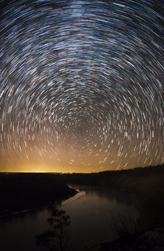 a beautiful night sky, Milky Way, star trails  and the trees