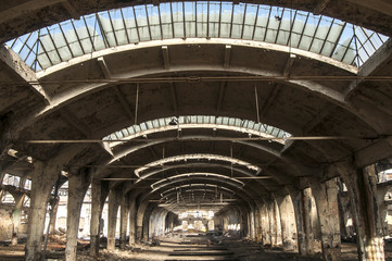 Old abandoned decayed grunge hall of vintage railway plant
