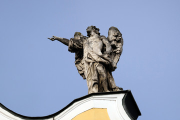 Angel on facade of Barmherzigenkirche in Graz, Austria 
