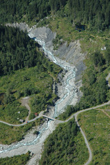Fototapeta na wymiar River and bridge nearby Grindelwald city in Switzerland.