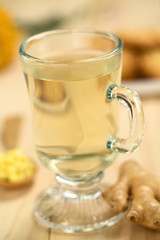 Freshly prepared hot ginger tea in glass