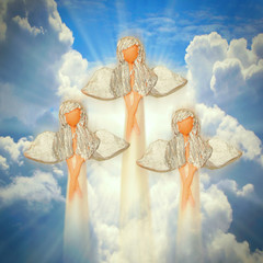 Three angels on the heaven. Spirituality concept.