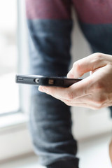 man hands touching smartphone