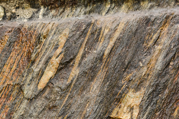 gray rock inside a tunnel
