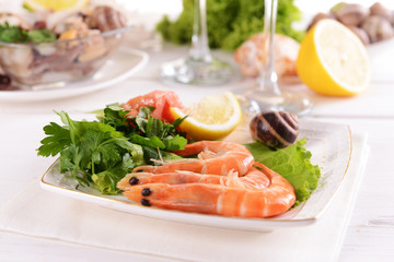 Tasty seafood on plate on table close-up