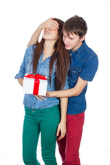 Happy Man giving a gift to his Girlfriend
