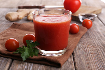 Glass of tomato juice with cherry tomatoes