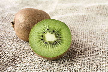 Kiwis on a rustic piece of cloth