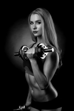 female with dumbbells