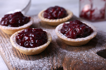Delicious cookies with jam and powdered sugar